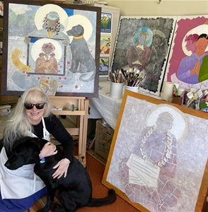 Catherine Lecce-Chong in her studio Catherine Lecce-Chong in her studio hugging guide dog