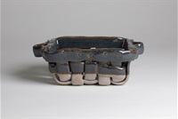 Woven ceramic rectangular container like those found at farmers' markets