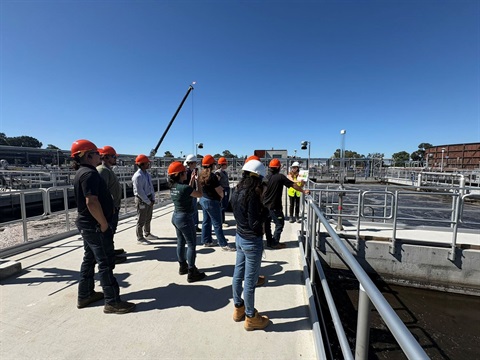 Participants on tour of wastewater treatment plant