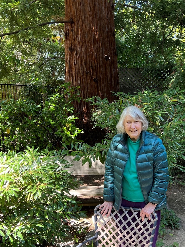 Enid-Pearson-with-heritage-redwood-tree-28April2022.jpg