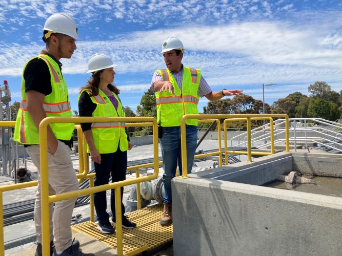 Photo of staff talking during tour of the Regional Water Quality Control Plant